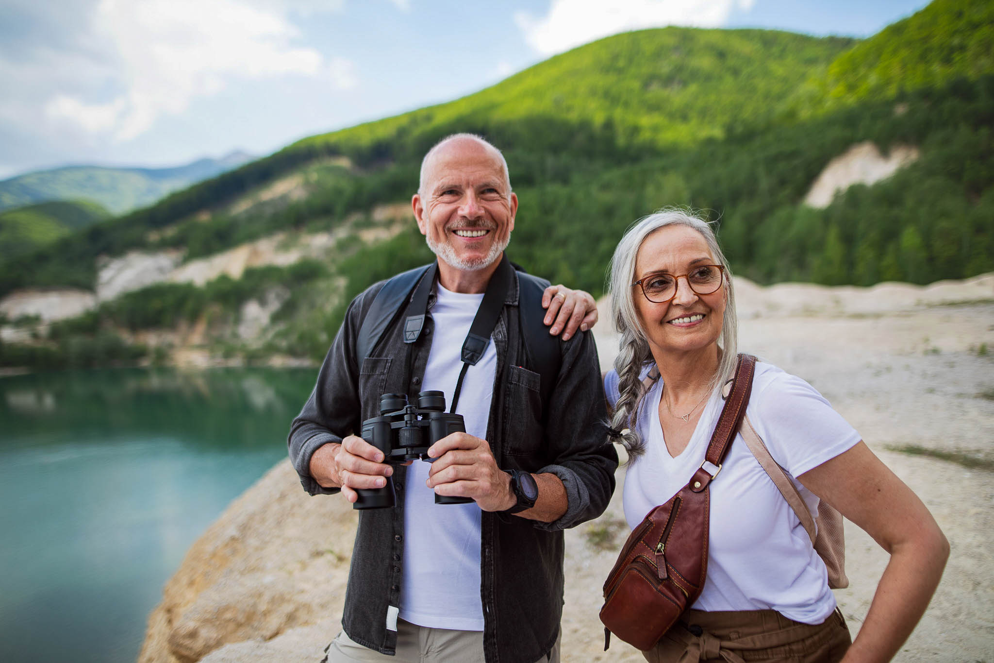 Couple at scenic mountain lake