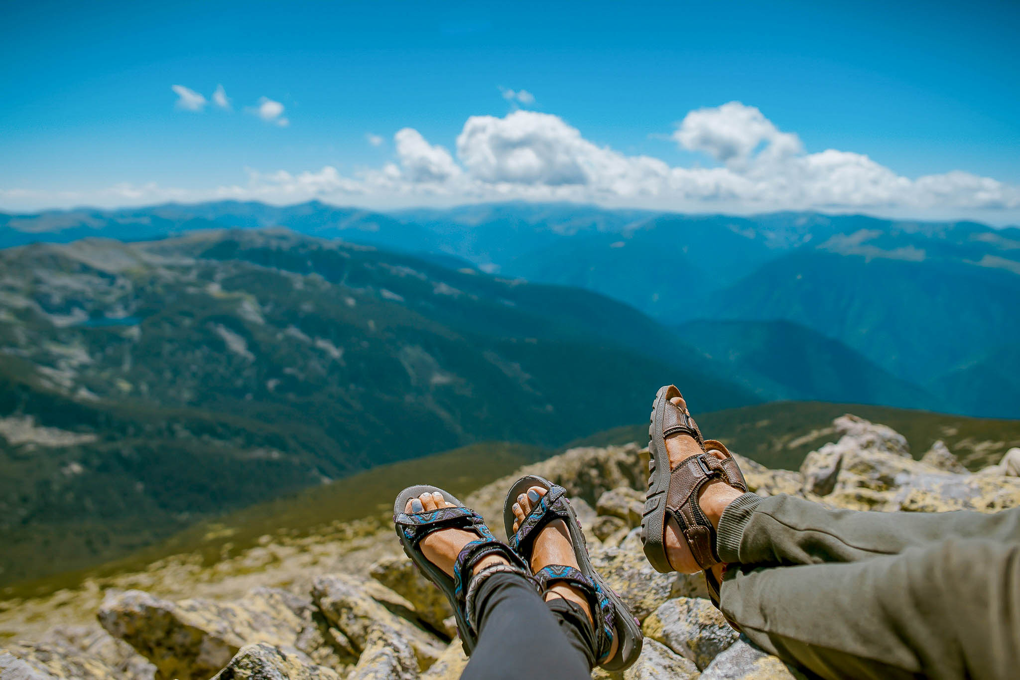 Feet on mountain overlook
